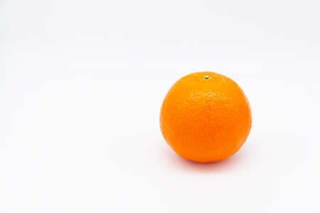 Yellow orange tangerine on white background. High quality photo. copy space for textの写真素材