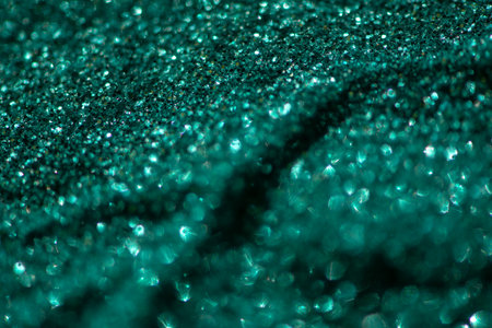 Shiny green glitter textured backgroundの写真素材