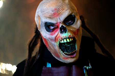 Close-up of monster face on a dark halloween horror night background