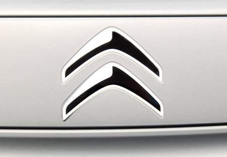 Riga,Latvia - April 29, 2022: Citroen  Ami car front logo over gray metallic paint.のeditorial素材