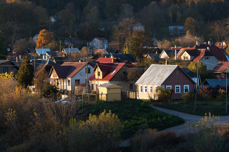 Autumn landscape with small town KrÄslava located at Daugava river in Latviaの写真素材
