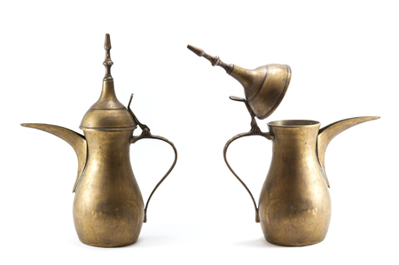 Antique thai brass teapot on white backgroundの写真素材