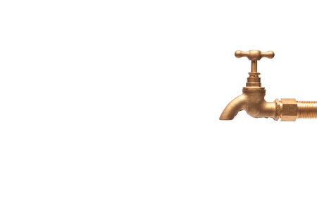 vintage golden brass valve isolated on white background.の写真素材
