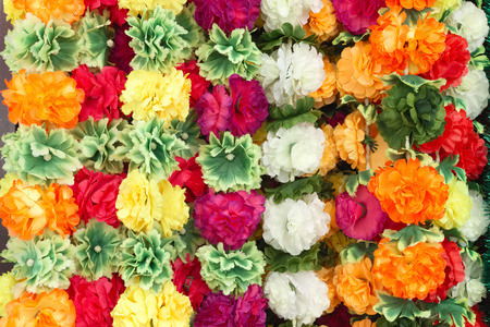 Colorful flower garlands used for decorating the god in hindu temples.の写真素材