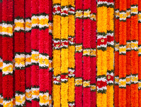 Garlands of red and yellow flowers, indian festive decoration.の写真素材