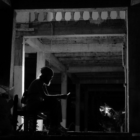 Silhouette of the man in desolated urban undergrounds