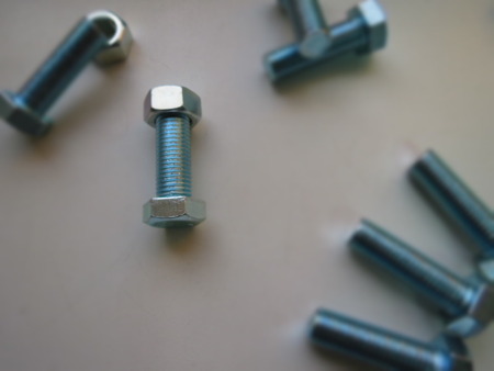 metal bolts and nuts tool isolated on white background