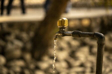 Tap with running water still photographの写真素材