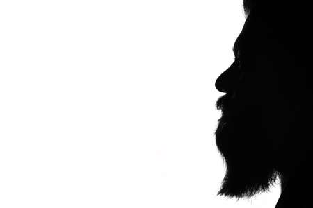 Silhouette of a beard man face isolated on white background