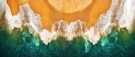 Aerial view on empty sandy tropical beach and ocean waves. Panoramic image