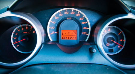 Modern car illuminated dashboard closeup
