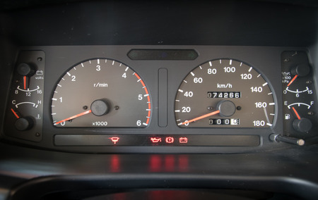 Modern car illuminated dashboard closeup