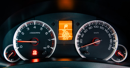 Modern car illuminated dashboard closeup