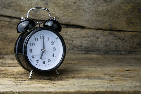 Morning alarm clock on tableの写真素材