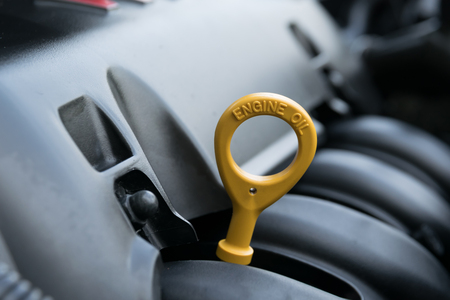 The oil dipstick of a car engineの写真素材