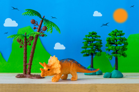 Triceratops dinosaur toy model on wild models backgroundの写真素材