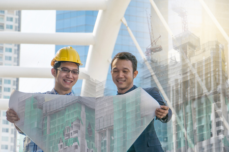 businessman worker handshaking on construction site