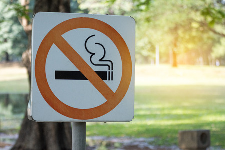 no smoking metal sign in the park.の写真素材