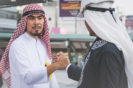 Arab businessmen worker handshaking on construction siteの写真素材