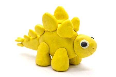 Play dough Stegosaurus on white backgroundの写真素材