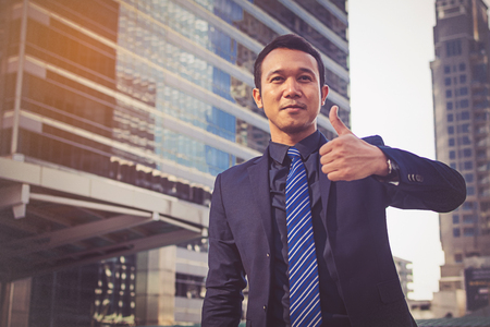Businessman showing thumbs upの写真素材