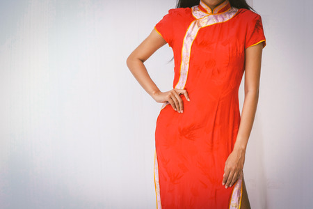Asian woman with cheongsam. Chinese new year.の写真素材