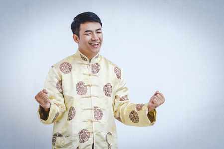 Happy Chinese man in traditional dressの写真素材