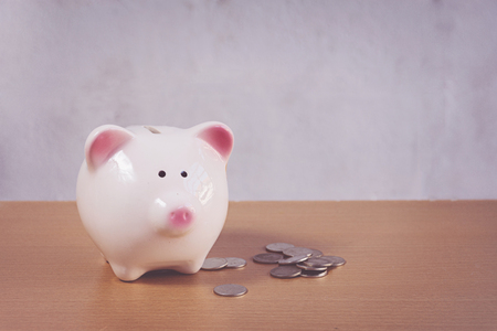 Piggybank and money towerの写真素材