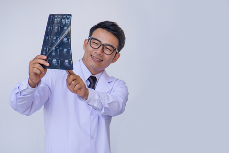 doctor and nurse checking patient information on a tablet deviceの写真素材
