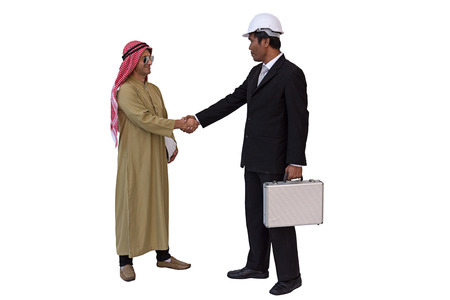 Arab businessman and foreman worker handshaking. isolated background with clipping pathの写真素材
