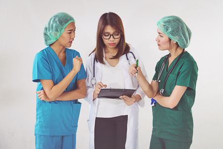 doctor and nurse checking patient informationの写真素材