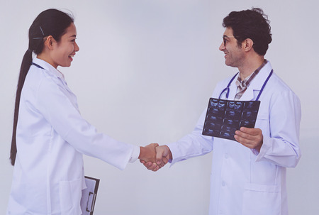 Doctors holding a clipboard with prescription, concept teamwork