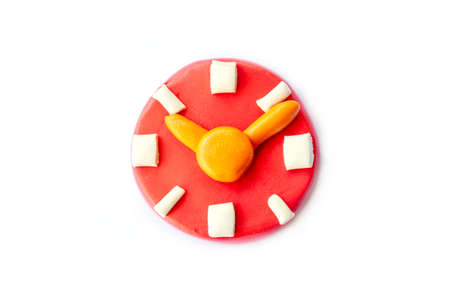 Play dough Clock on white background. Icon clock. Handmade clay plasticine