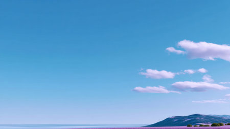 A soft blue sky minimal landscape calm horizon sea mountainの素材