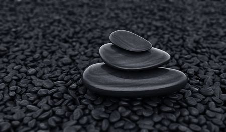 3d rendering of stacked stones on smaller stonesの写真素材