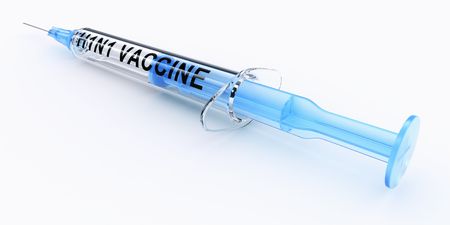 3d rendering of syringe with h1n1 vaccine written on itの写真素材