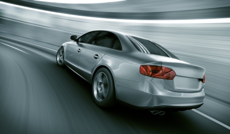 3d rendering of a brandless generic car of my own design in a tunnel with heavy motion blurの写真素材