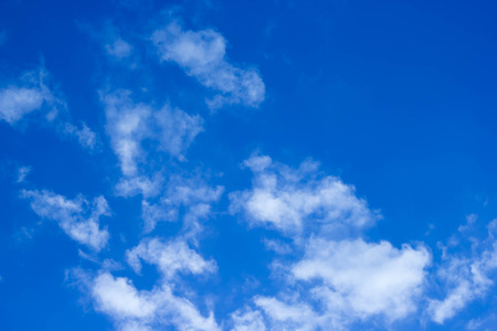Blue sky with clouds closeup の写真素材