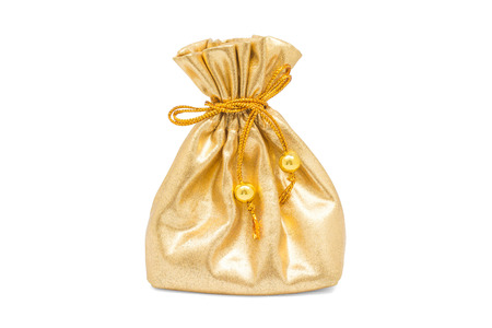 Golden gift sacks  isolated on white background の写真素材