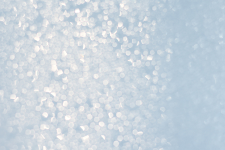 Abstract of bright and sparkling bokeh background-blurred lighting from glitter texture.Selective focusの写真素材