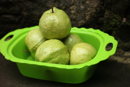 Crystal Guava (Psidium guajava) or Crystal Guava, served in green plastic.の写真素材