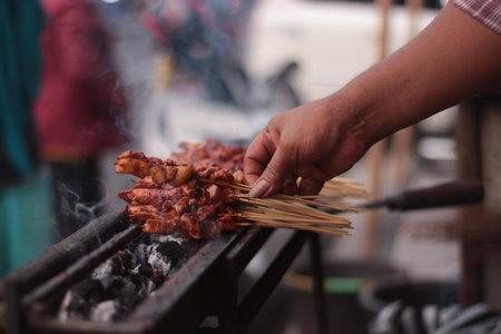Grilled pork at street food in thailand. (Selective focus)