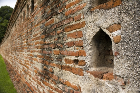old brick wall in thai styleの写真素材