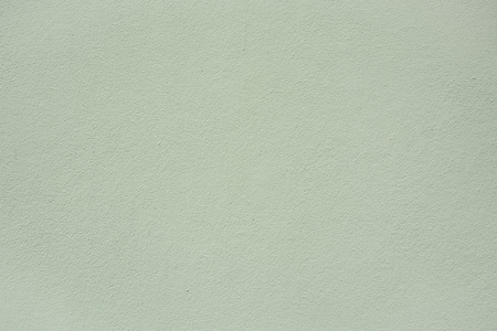 Green plaster wall texture backgroundの写真素材