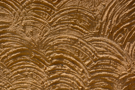 Brown wave plaster texture wallの写真素材