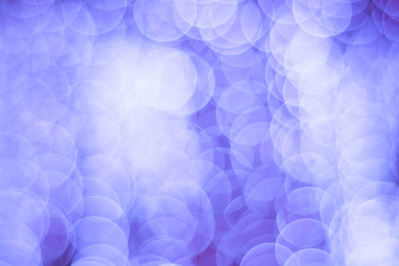 Abstract Background of blurred violet lights with bokeh effectの写真素材