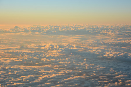 Sky and clouds in the evening taken from airplaneの写真素材