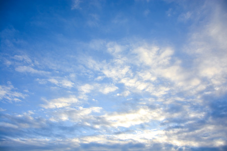 Blue sky with white cloud backgroundの写真素材