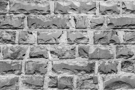 Close-up of gray broken brick wall texture backgroundの写真素材