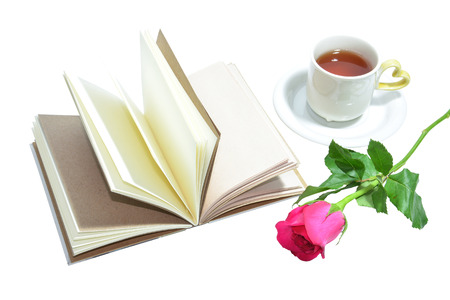 tea cup of love , handmade book and pink roseの写真素材